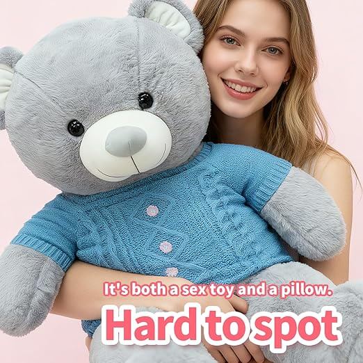 A woman holding a Plush Teddy Bear Pillow Thrusting Dildo, showcasing its soft design and dual function as a toy and pillow.