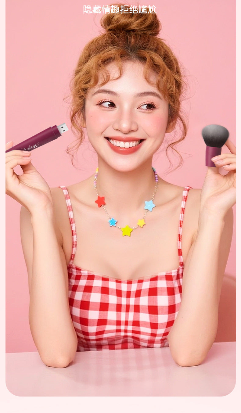 Woman Using Makeup Brush Vibrator